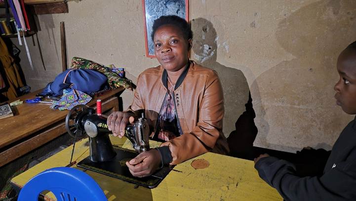 Molly in her sewing shop